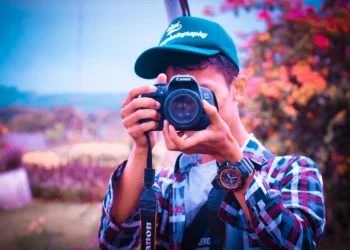 Aspiring photographer mastering photography