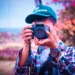 Aspiring photographer mastering photography